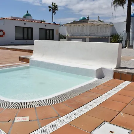 Almina Коральео