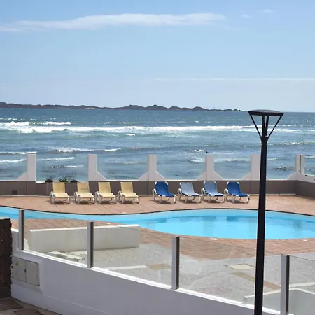 Almina Коральео