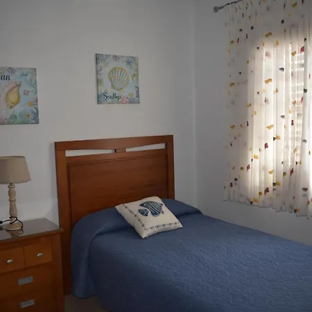 Almina Коральео